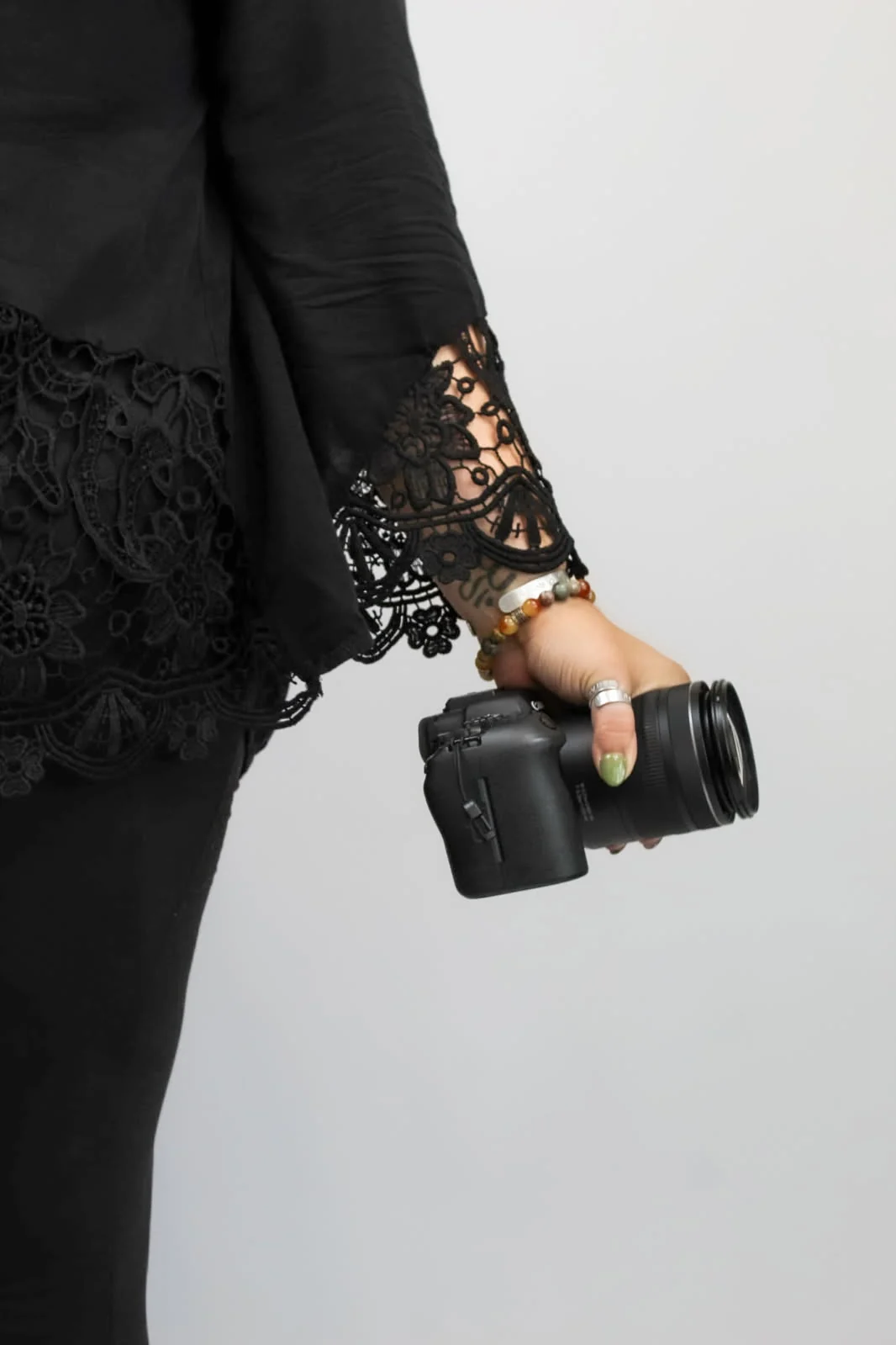 Renae holding her camera